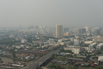 Obraz premium Cityscape and Skyline of Bangkok and Chao Phraya River on the Day with Pollution of PM2.5 Above Dangerous Level.