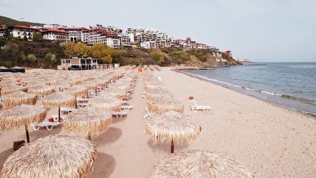 Luxury Resort FPV Orbit Beach Umbrellas Reveal Sea View Drone Aerial Black Sea Off Season Bulgaria Europe