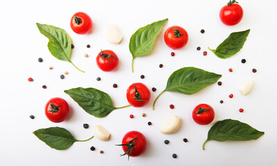 Tomato cherry, basil, spices, pepper. Fresh organic tomatoes, isolated on white.