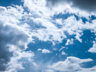 White clouds in the blue sky.