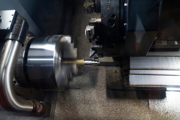 machining automotive part by cnc turning machine