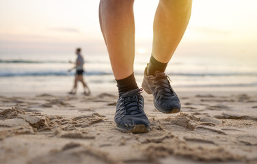 person walking on the beach