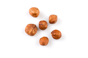 Hazelnuts on the white background