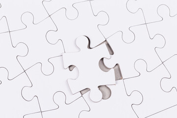 white puzzle jigsaw close up