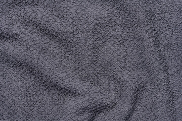 Texture of a gray terry cotton towel, canvas. Macro