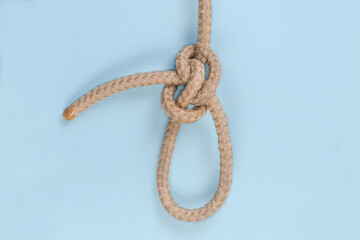 Rope Zeppelin eye knot on a blue background