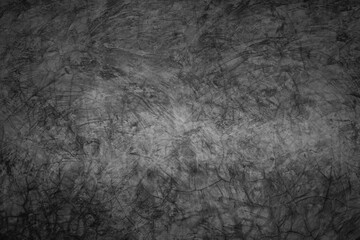 The texture of the old concrete wall for the dark background, cement and concrete texture for the pattern and background, and Dark grunge textured wall close up