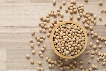 Top view of Soybeans in a bowl on wooder background, Healthy eating concept