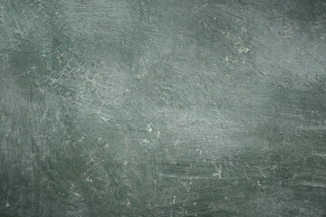 Texture of dark vintage green stone background, Wide banner. Abstract grunge decorative stucco wall texture. Wide rough background with copy space for text