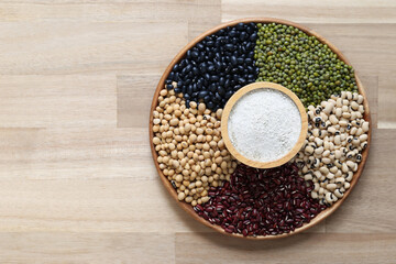 Top view of Five colour of sean drink powder greenpea in a bowl on wooder background, Healthy eating concept