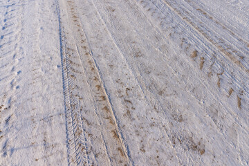 A road covered with snow and ice for cars