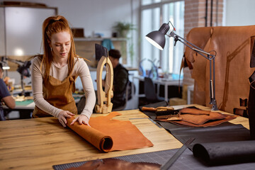 young pretty prepare natural material for work close up portrait. copy space