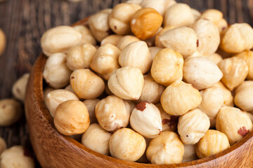 Roasted and shelled hazelnuts on the table, crisp fresh hazelnut harvest on the table in the kitchen
