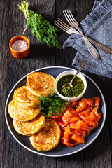 pancakes with sliced cold smoked salmon, top view