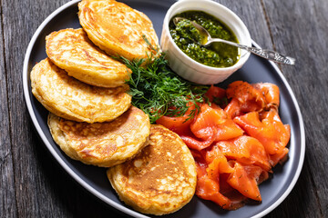 pancakes with sliced cold smoked salmon, top view