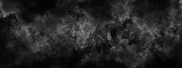 Abstract black watercolor background painting. Black background texture in painted watercolor.	