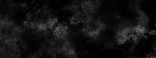 Abstract black watercolor background painting. Black background texture in painted watercolor.	