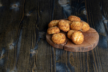 Delicious cookies with coconut on the table