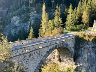 The old stone arch bridge over the river Albula and the Schin canyon (Schinschlucht or Schynschlucht) and next to the Solis viaduct, Albula - Canton of Grisons, Switzerland (Schweiz)