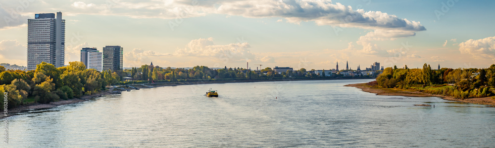 Wall mural BONN, GERMANY - October 8 2022: Ferry boat on Rhine River. 