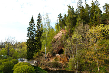 Nature park with natural cave in Latvia