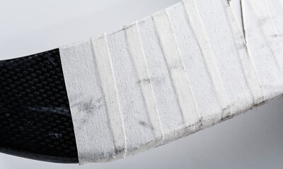 Close up white hockey tape on a hockey stick