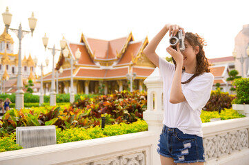 Beautiful young Asian tourist woman on vacation sightseeing and exploring Bangkok city, Thailand, Holidays and traveling concept