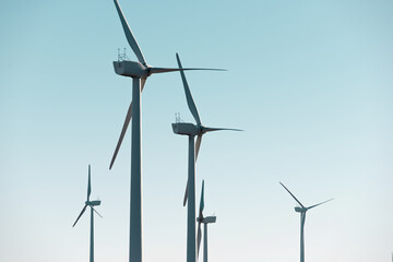Silhouettes of windmills for the production of energy