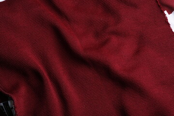 Fabric texture close up in dark red