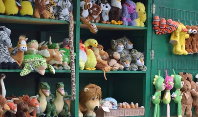 Fototapete Dinosaurier animal doll at market stall  © NOCROBO