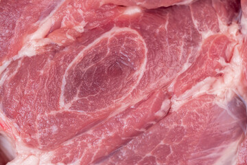 A cut piece of pork close up