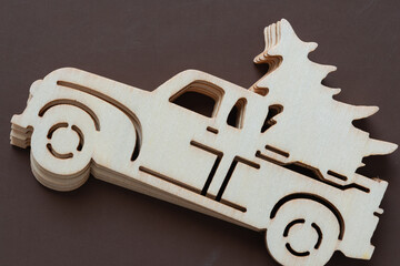 pile of truck with tree objects or holiday ornaments made of wood