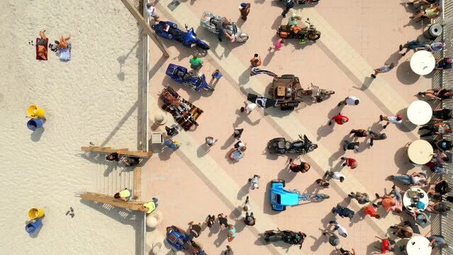 Aerial overhead video Daytona Beach bike week boardwalk motorcycles on display show