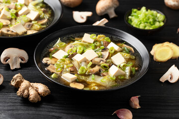 Cabbage Tofu Soup with mushrooms and spring onion.
