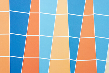 abstract background with paper stripes and grid pattern in orange and blue (triangles)