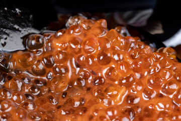 Natural red salmon caviar in large quantities