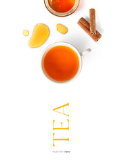 Creative layout made of tea, honey and cinnamon sticks on the white background. Flat lay. Food concept. 