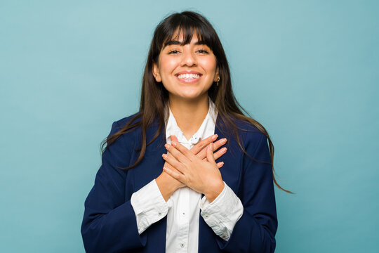 Relaxed happy woman grateful for her business