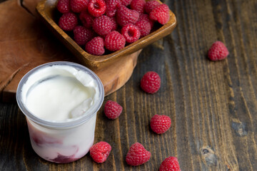 Fresh delicious milk yogurt with raspberry flavor
