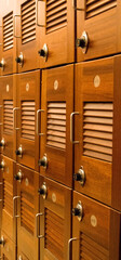 CHICAGO, ILLINOIS, UNITED STATES - Dec 11, 2015: Wooden lockers with combination locks in a fitness center of a luxury hotel in downtown Chicago