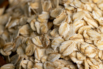 Oat flakes poured on the kitchen table