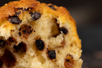 Sweet fresh cupcake with chocolate pieces