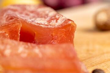 Square chicken fillet sausage, close up