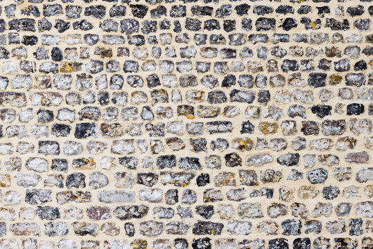 typical flintstone masonry  in Normandy, France