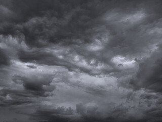 Dark gray heavy clouds. Dramatic sky background for design. Rainy cloudy windy weather. Gloomy...