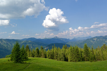 Mountain landscape in the Bavarian Alps with blue sky and clouds in summer, Germany, Europe