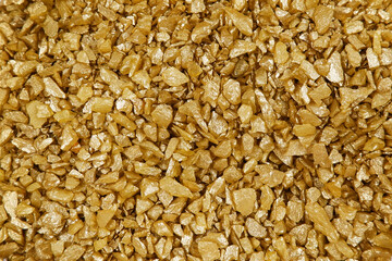 Background of golden stones. Collection of nuggets, texture of yellow metal stone samples, gold...