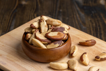 Fresh Brazil nuts peeled from the shell on the table