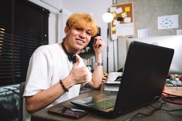 Caucasian young men using laptop for freelance programmer coding work at home, Work overtime concept.