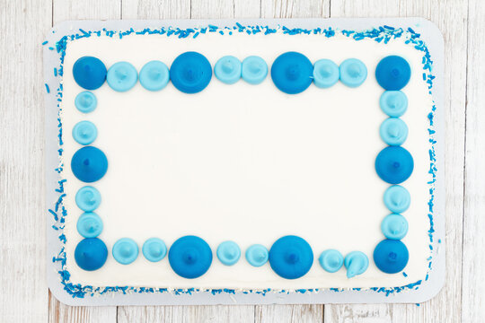 Blank white and blue birthday cake